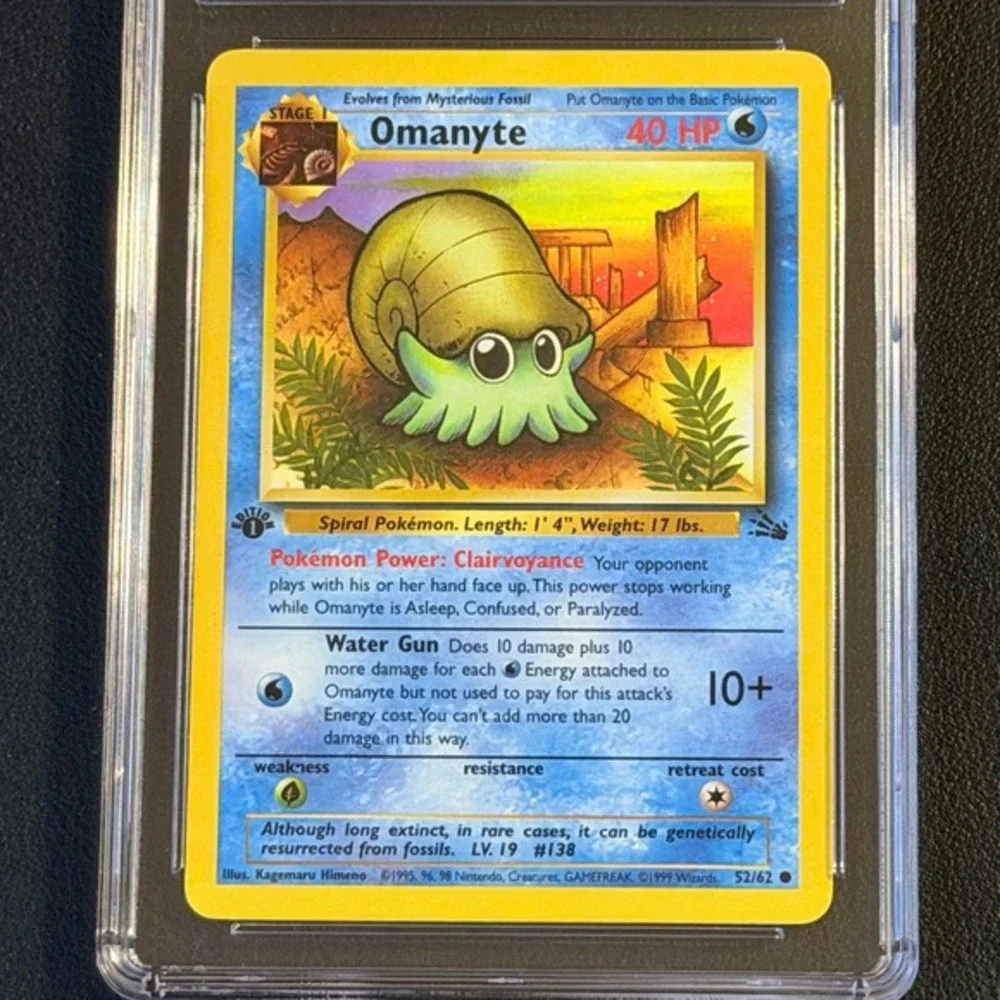 Pokemon Omanyte 1st Edition Fossil 52/62 CGC 8.5 NM/Mint+ TCG 1999 WOTC Vintage